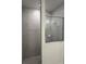 This shower is lined with gray tile and features a glass enclosure at 5530 Sw 103Rd St Rd, Ocala, FL 34476