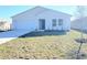 New construction home featuring a two-car garage and minimalist landscaping at 2491 Nw 23Rd Ave, Ocala, FL 34475