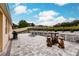 Large backyard with patio, retaining wall, and plenty of space for entertaining at 30120 Hackney Loop, Mount Dora, FL 32757