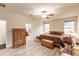 Spacious bedroom with wood flooring and large windows at 30120 Hackney Loop, Mount Dora, FL 32757