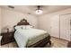 Spacious bedroom with a queen bed and built-in wardrobe at 30120 Hackney Loop, Mount Dora, FL 32757