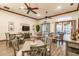 Bright dining room with tables and chairs at 30120 Hackney Loop, Mount Dora, FL 32757