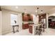 Spacious kitchen with granite countertops, stainless steel appliances, and ample cabinetry at 30120 Hackney Loop, Mount Dora, FL 32757