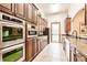 Modern kitchen with stainless steel appliances at 30120 Hackney Loop, Mount Dora, FL 32757