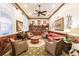 Community library with comfortable seating and bookshelves at 30120 Hackney Loop, Mount Dora, FL 32757