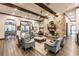 Relaxing living room with fireplace and seating at 30120 Hackney Loop, Mount Dora, FL 32757