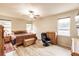 Relaxing main bedroom with wood flooring and ample natural light at 30120 Hackney Loop, Mount Dora, FL 32757