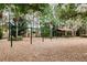 playground with swings and shaded seating at 30120 Hackney Loop, Mount Dora, FL 32757