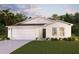 One-story home with attached garage and landscaped lawn at 734 Del Prado Dr, Poinciana, FL 34758