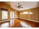 Spacious bedroom with hardwood floors and ceiling fan at 388 Hampton Hills Ct, Debary, FL 32713