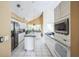 Kitchen with stainless steel appliances and white cabinets at 388 Hampton Hills Ct, Debary, FL 32713