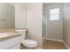 Clean bathroom with single sink vanity and shower/tub combo at 5634 Moon Valley Dr, Lakeland, FL 33812