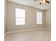 Spacious bedroom featuring tile floors and ceiling fan at 5634 Moon Valley Dr, Lakeland, FL 33812