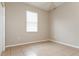 Simple bedroom with tile floors and a window with blinds at 5634 Moon Valley Dr, Lakeland, FL 33812