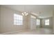 Bright dining room with tile floors and neutral walls at 5634 Moon Valley Dr, Lakeland, FL 33812