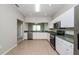 Kitchen with stainless steel appliances and green countertops at 5634 Moon Valley Dr, Lakeland, FL 33812