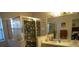 Clean bathroom with double vanity and shower stall at 2325 Paulette Dr, Haines City, FL 33844