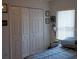 Bedroom with double door closet and window at 2325 Paulette Dr, Haines City, FL 33844