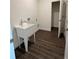 Functional laundry room features modern sink and hookups at 4275 Sw 106Th Pl, Ocala, FL 34476