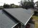 A view of the roof showcasing its grey shingles and clean lines at 1223 Lawrence Ave, Deltona, FL 32725