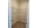 Walk-in closet with carpet, a metal shelving system, and a neutral color palette at 999 Brooklet Dr, Davenport, FL 33837