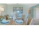 Cozy dining room with a rustic table setting and modern decor at 1840 India Palm Dr, Edgewater, FL 32141