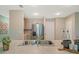 Close up of the kitchen sink and island, featuring stainless steel appliances and neutral toned cabinetry at 1840 India Palm Dr, Edgewater, FL 32141
