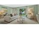Inviting living room featuring stylish furnishings and ample natural light at 1840 India Palm Dr, Edgewater, FL 32141