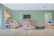 Comfortable living room with modern decor and a large TV at 1840 India Palm Dr, Edgewater, FL 32141