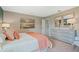 A comfortable bedroom with a full bed, dresser, and neutral tones for a relaxing atmosphere at 1840 India Palm Dr, Edgewater, FL 32141