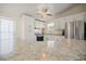 Modern kitchen with stainless steel appliances, granite countertops, and a spacious design at 906 Beechwood Ave, Lady Lake, FL 32159