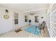 Covered patio with ceiling fan, rug and outdoor seating at 906 Beechwood Ave, Lady Lake, FL 32159