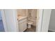 Bathroom featuring a vanity with modern fixtures, a toilet, and a shower-tub combination at 521 Cardinal Dr, Poinciana, FL 34759