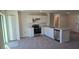 Well-appointed kitchen with stainless steel appliances, modern cabinetry, and an open layout to the living area at 521 Cardinal Dr, Poinciana, FL 34759