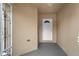Enclosed foyer featuring neutral walls, tile floor, and a white front door at 26922 White Plains Way, Leesburg, FL 34748