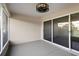 Cozy screened lanai with fan offers a relaxing outdoor space at 26922 White Plains Way, Leesburg, FL 34748