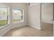 Bright dining area featuring tile floors and large windows for plenty of natural light at 580 Tree Shore Dr, Orlando, FL 32825