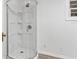 Close-up view of a corner shower with glass door at 1309 Sanford Ave, Sanford, FL 32771