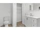 Clean bathroom with new vanity, sink, and toilet at 1309 Sanford Ave, Sanford, FL 32771