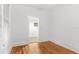 Cozy bedroom featuring hardwood floors and natural lighting at 1309 Sanford Ave, Sanford, FL 32771