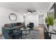 Bright living room featuring modern decor, comfortable seating, and an open layout at 760 S Park Ave, Winter Garden, FL 34787