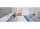 Bright bedroom featuring plush bedding and an ensuite bathroom with modern fixtures that offers comfort and convenience at 540 Glade Ct, Kissimmee, FL 34758