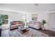 Inviting living room with natural light, two sofas, and stylish decor for comfortable living at 540 Glade Ct, Kissimmee, FL 34758