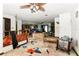 View of the living room, kitchen, and surrounding interior; shows damage throughout the home at 1915 Poinsettia Dr, Port Orange, FL 32128