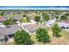 Beautiful aerial view of the neighborhood, showcasing lush landscaping and well-maintained homes at 3514 Yacht Club Ct, Kissimmee, FL 34746