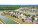 Stunning aerial view of waterfront homes in a serene community with lush greenery and picturesque waterways at 3514 Yacht Club Ct, Kissimmee, FL 34746