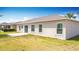 Well-maintained backyard with lawn and patio area, perfect for outdoor entertaining at 3514 Yacht Club Ct, Kissimmee, FL 34746