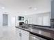 Well-lit kitchen with a breakfast bar, stainless steel appliances, and an open layout perfect for entertaining at 3514 Yacht Club Ct, Kissimmee, FL 34746