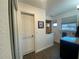 Bathroom with shower, new sink and dark wood-look flooring at 6519 Shadowbrook Run, Lakeland, FL 33813