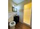Bathroom with black vanity and shower, ensuring a clean and functional space at 5801 Poinciana Ave, Lakeland, FL 33809